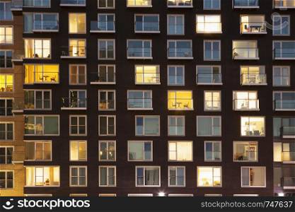 Modern apartment block at dusk