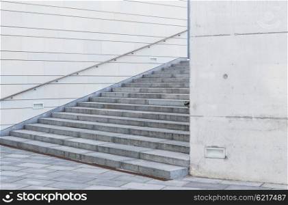 modern architecture concept - close up of urban city stairs with railing. close up of urban city stairs with railing