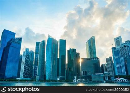 Modern atchitecture of Singapore Downtown Core at sunset