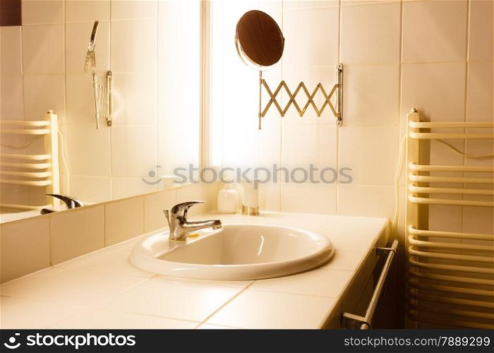 Modern bathroom interior with sink and mirror