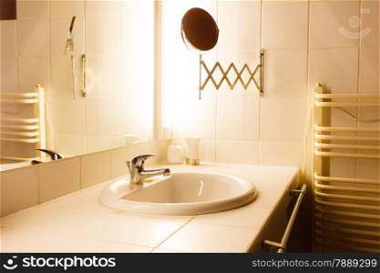 Modern bathroom interior with sink and mirror