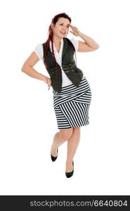 Modern beautiful woman wearing vest and striped skirt isolated on white background.