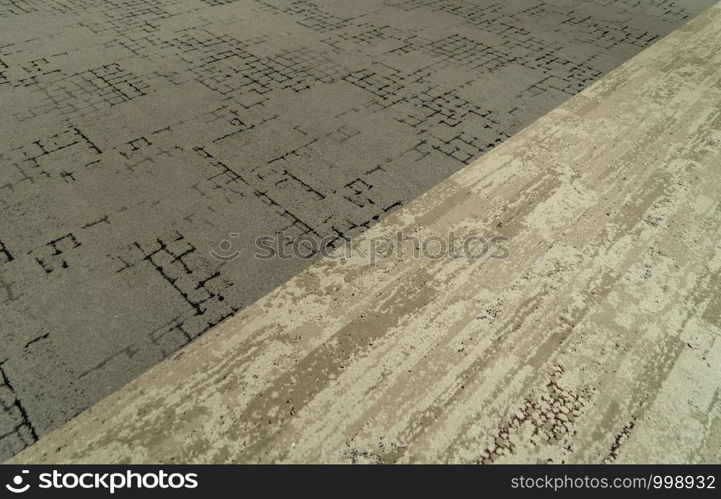 Modern beige carpet fabric flooring pattern surface texture in office. Close-up of interior material for design decoration background