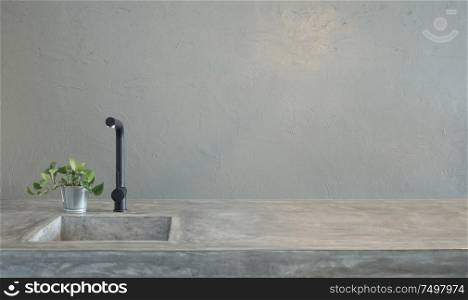 Modern black faucet and kitchen room sink with cement countertops and green grass .