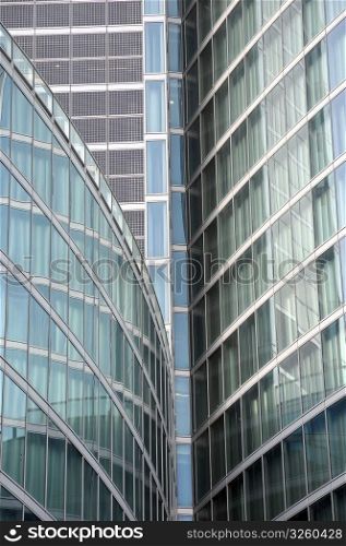 Modern building glass facades geometric lines and reflections