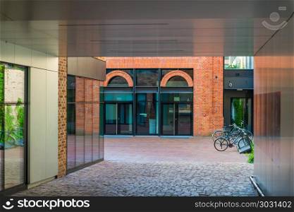 modern buildings in the city of brick and bicycle parking