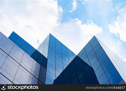 Modern buildings with blue sky and cloud in sunny day.