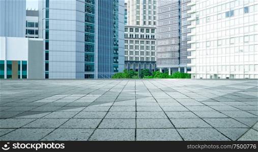 modern buildings with empty concrete square floor