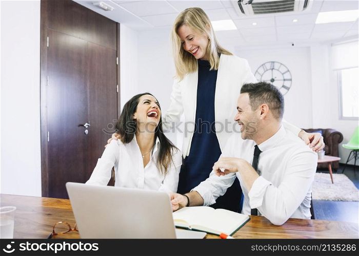 modern business people laughing