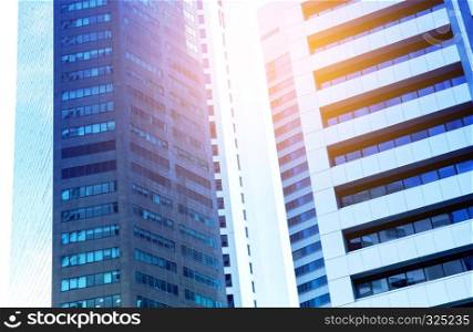 Modern business skyscrapers with high buildings in blue tone, architecture business concept.