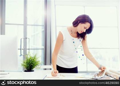 Modern business woman in the office. Modern successful business woman