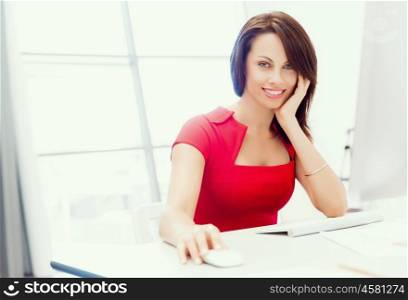 Modern business woman sitting in the office. Modern successful business woman