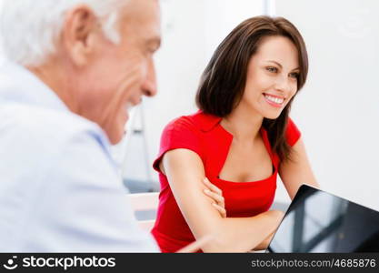 Modern business woman sitting in the office. Modern successful business woman