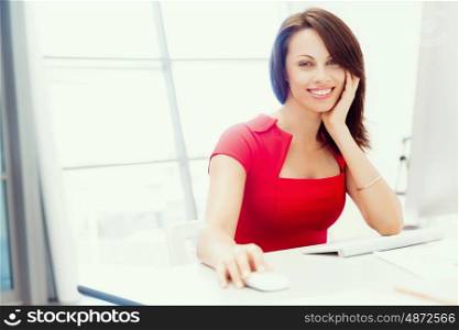 Modern business woman sitting in the office. Modern successful business woman