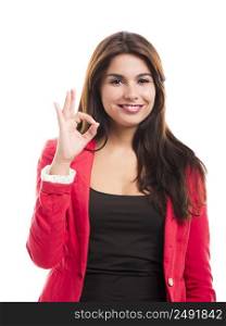 Modern business woman smiling and doing a OK sign with her hand, isolated over a white background