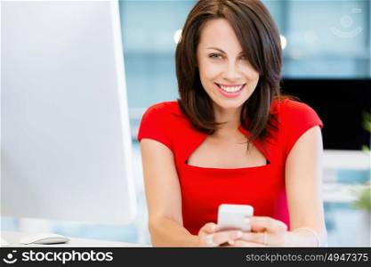 Modern business woman with mobile phone. Modern successful business woman