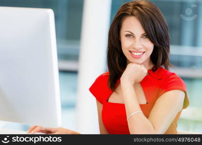 Modern business woman working on computer. Modern successful business woman