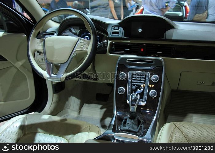 Modern car interior, luxurious materials in different shades of grey