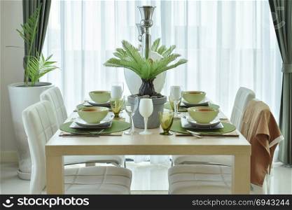 Modern ceramic tableware decorated on dining table