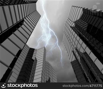 Modern city. Bottom image of skyscraper with thunder lightning in sky