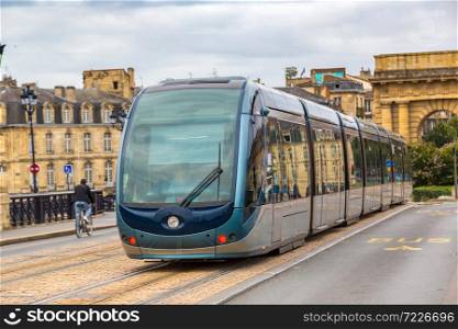 Modern city tram in Bordeaux in a beautiful summer day, France