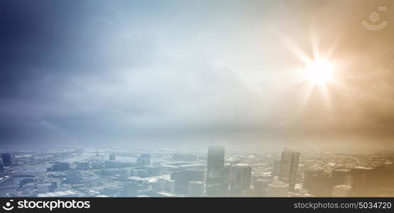 Modern city. Urban scene with buildings and skyscrapers in sunlight