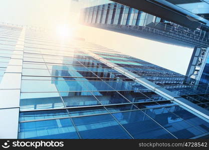 Modern city view. Top view of modern city in lights of sunset