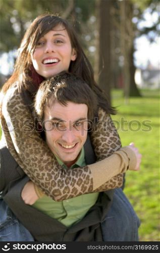Modern Couple Playing In The Park