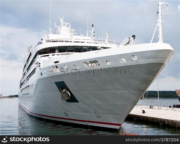 modern cruise ship anchored in port