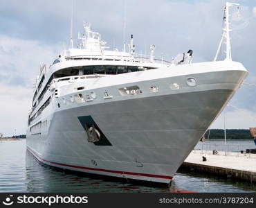 modern cruise ship anchored in port