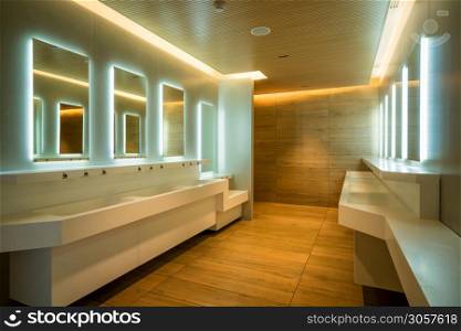 Modern design of public toilet and restroom. Luxury interior.. Modern design of public toilet and restroom.