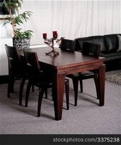 Modern dining table in an stylish furnished modern house