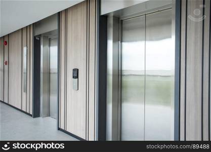 modern elevator made of metal in building