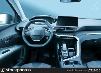 Modern family car or SUV vehicle cabin interior with stylish design and large led displays