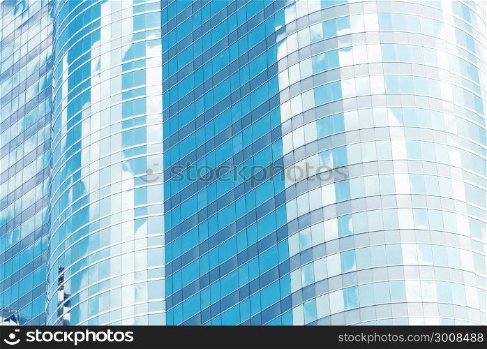 Modern glass office building texture close up for abstract background.