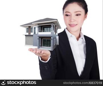modern home in business woman hand isolated on white background