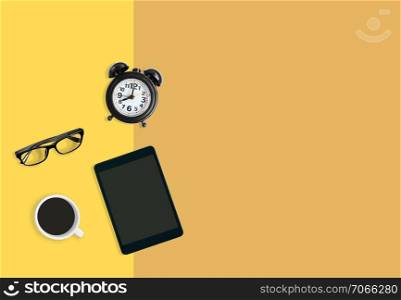 Modern home office workplace concept, Black alarm clock, A cup of black coffee, eyeglasses and tablet on yellow pastel background with copy space