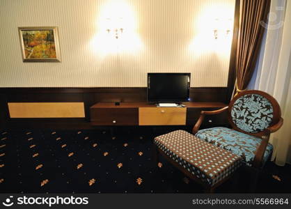 modern hotel room appartment indoor with double bed and lcd tv