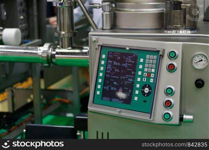 Modern industrial equipment in food production factory. Selective focus.