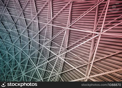 Modern interior architecture of metal steel roof structure of airport or industrial factory.