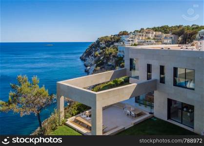 Modern interior by the sea. Outdoor architecture with a fantastic view of the mediteranee sea on the island of Majorca