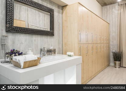 Modern interior of a shower room with a washbasin. interior of the shower room