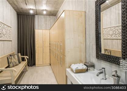 Modern interior of a shower room with a washbasin. interior of the shower room