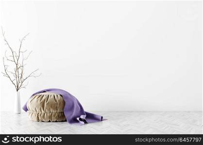 Modern interior of living room with beige pouf and purple plaid on it over white wall 3d rendering