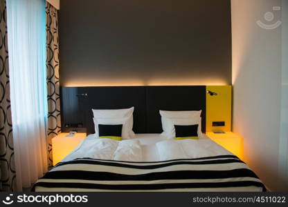 Modern interior of the bedroom