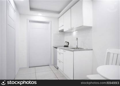 Modern interior white kitchen room with built-in furniture mockup showcase for boutique hotel room, apartment, residential