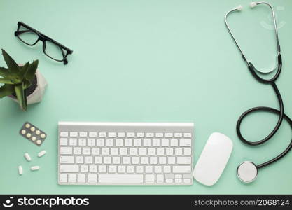 modern keyboard mouse with medicines surface