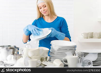 Modern kitchen - happy woman washing dishes, housework