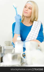 Modern kitchen - happy woman washing dishes, housework