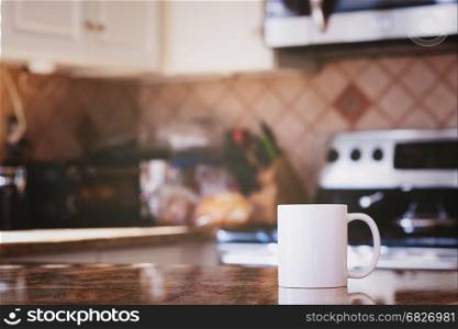 Modern kitchen interior and white coffee mug